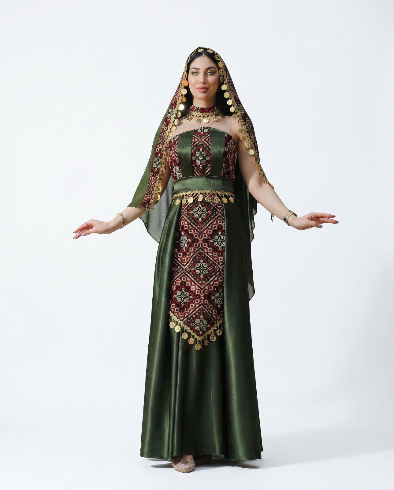 Palestinian embroidered green thobe dress with traditional Tatreez design