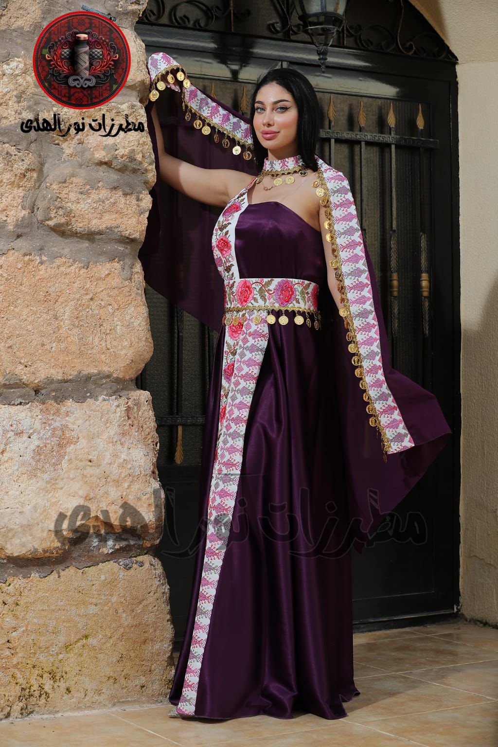 Mauve pink satin Palestinian embroidered henna dress with floral front panel, matching draped cover, and traditional coin details