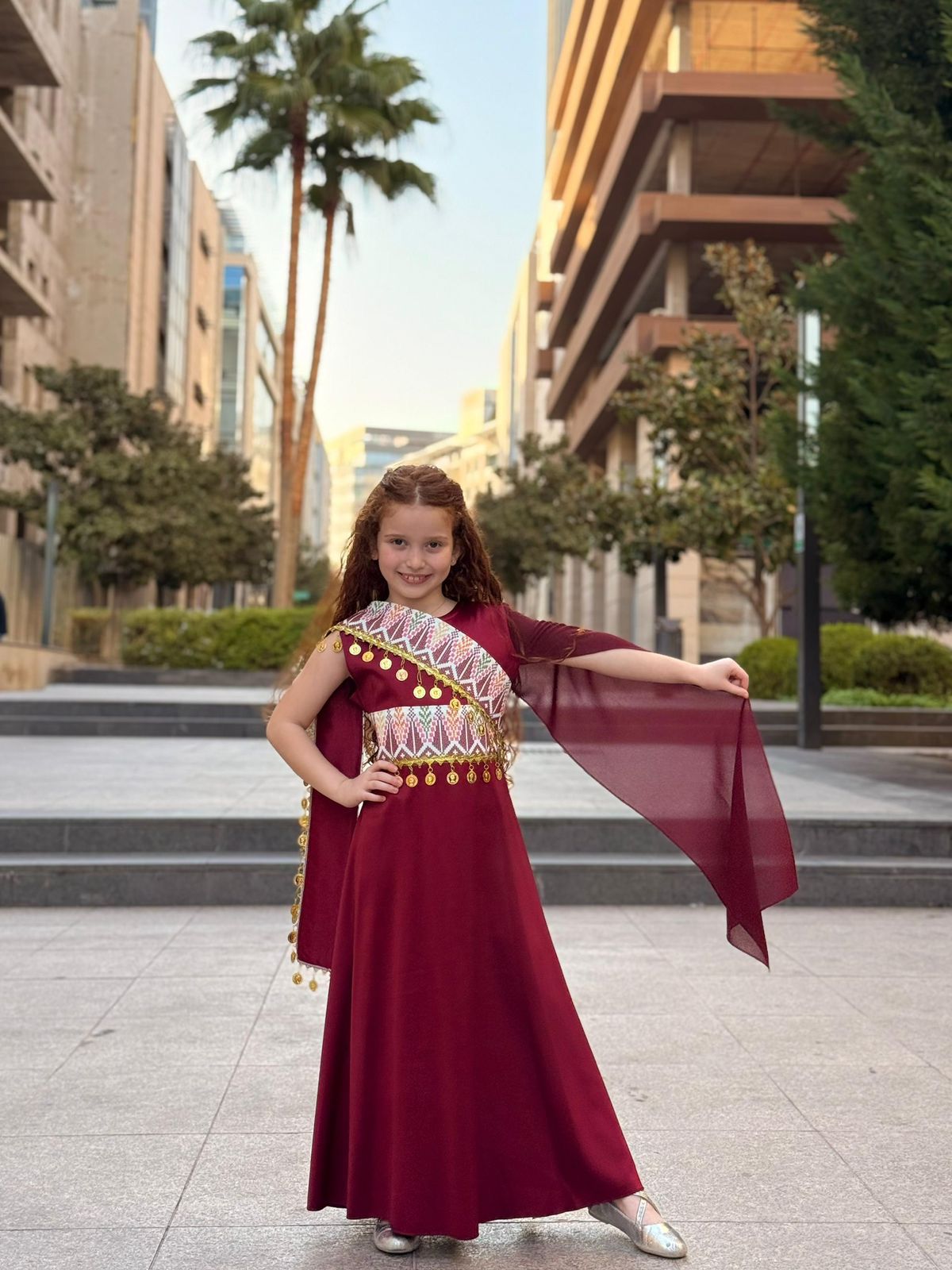 Burgundy girls traditional embroidered shoulder dress with Tatreez-inspired bodice and coin accents