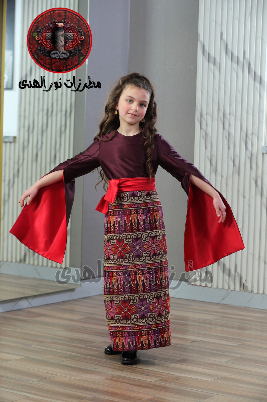 Burgundy girls Oriental embroidered satin dress with red sash, split sleeves, and colorful heritage embroidery panel