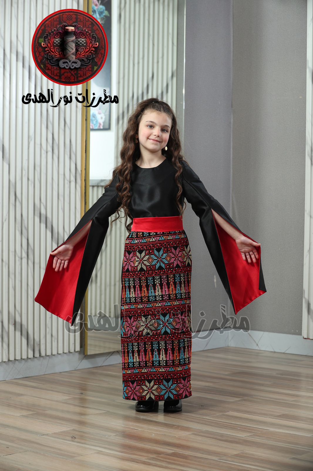 Black girls Oriental embroidered satin dress with red waist sash, split sleeves, and red heritage skirt panel