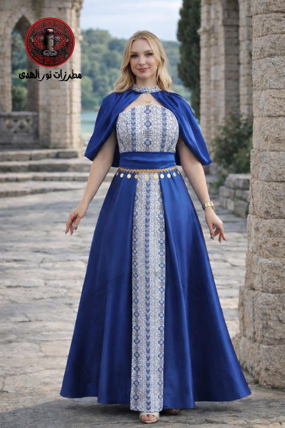Indigo blue embroidered henna dress with keyhole neckline, cape sleeves, and heritage-inspired front panel