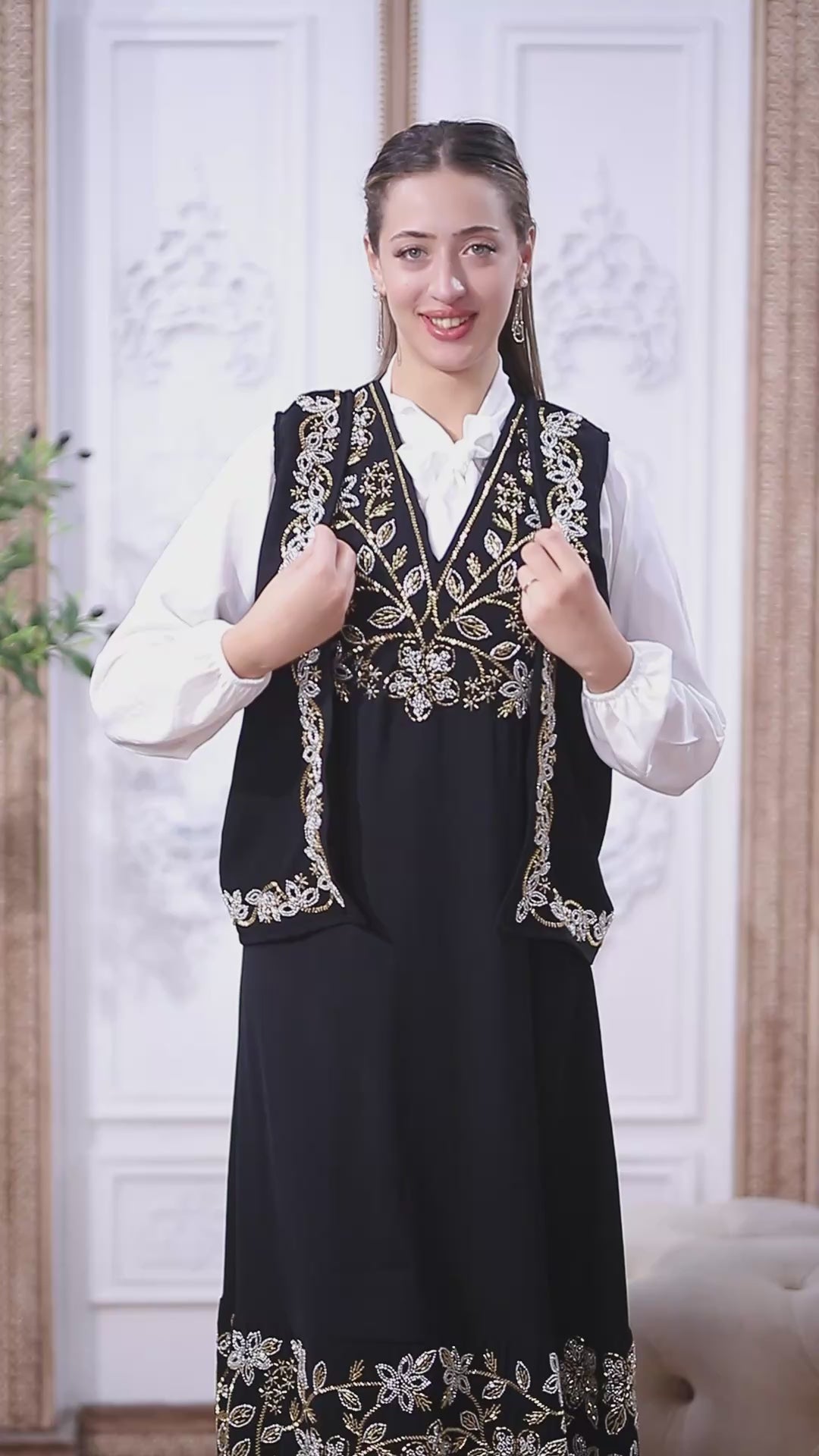 تحميل الفيديو: Product Description: Traditional Jordanian Black Mudraqa Dress with Gold &amp; Silver Bead Embroidery