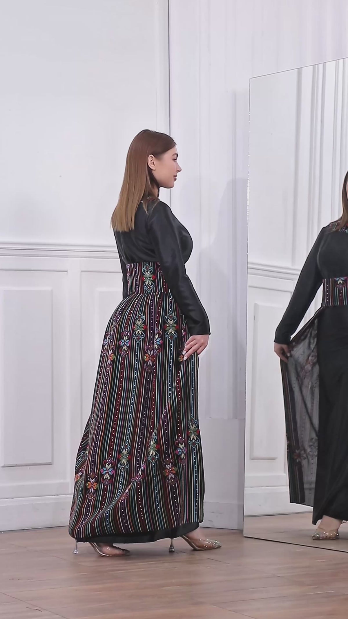 Load video: Black Satin Oriental Embroidered Thobe with Colorful Tatreez Details | Al-Ameera Thobe