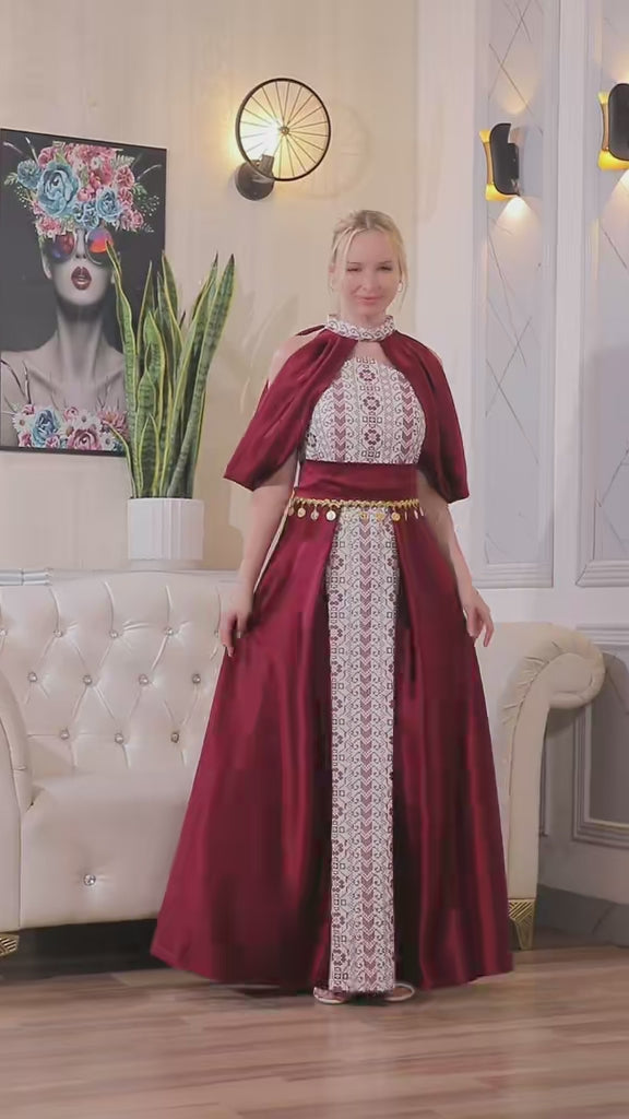 Place the product showcase video after the main image gallery or directly below the product description. This placement helps customers see the movement of the cape sleeves, the full dress silhouette, and the embroidered front details before choosing their size and color.